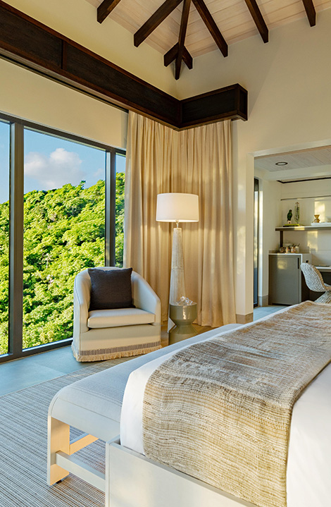 a room with a bed and a chair