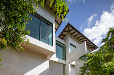 a building with windows and trees