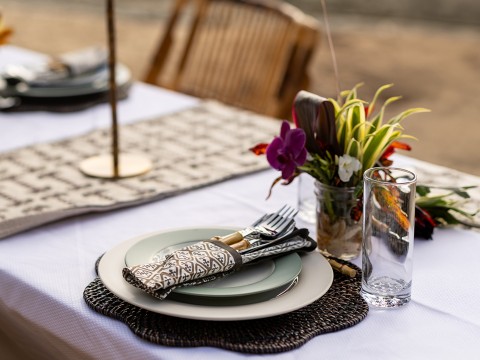 a table set with plates and cutlery