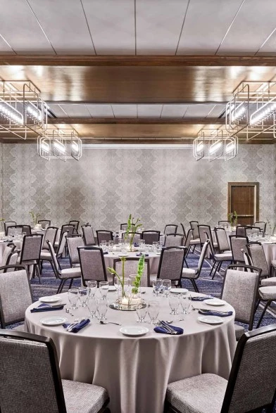 event room with tables and chairs