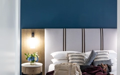 a man sleeping on a bed