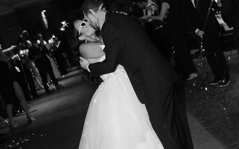 a man and woman kissing