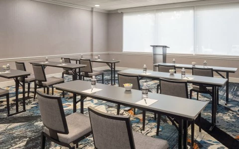 a room with tables and chairs