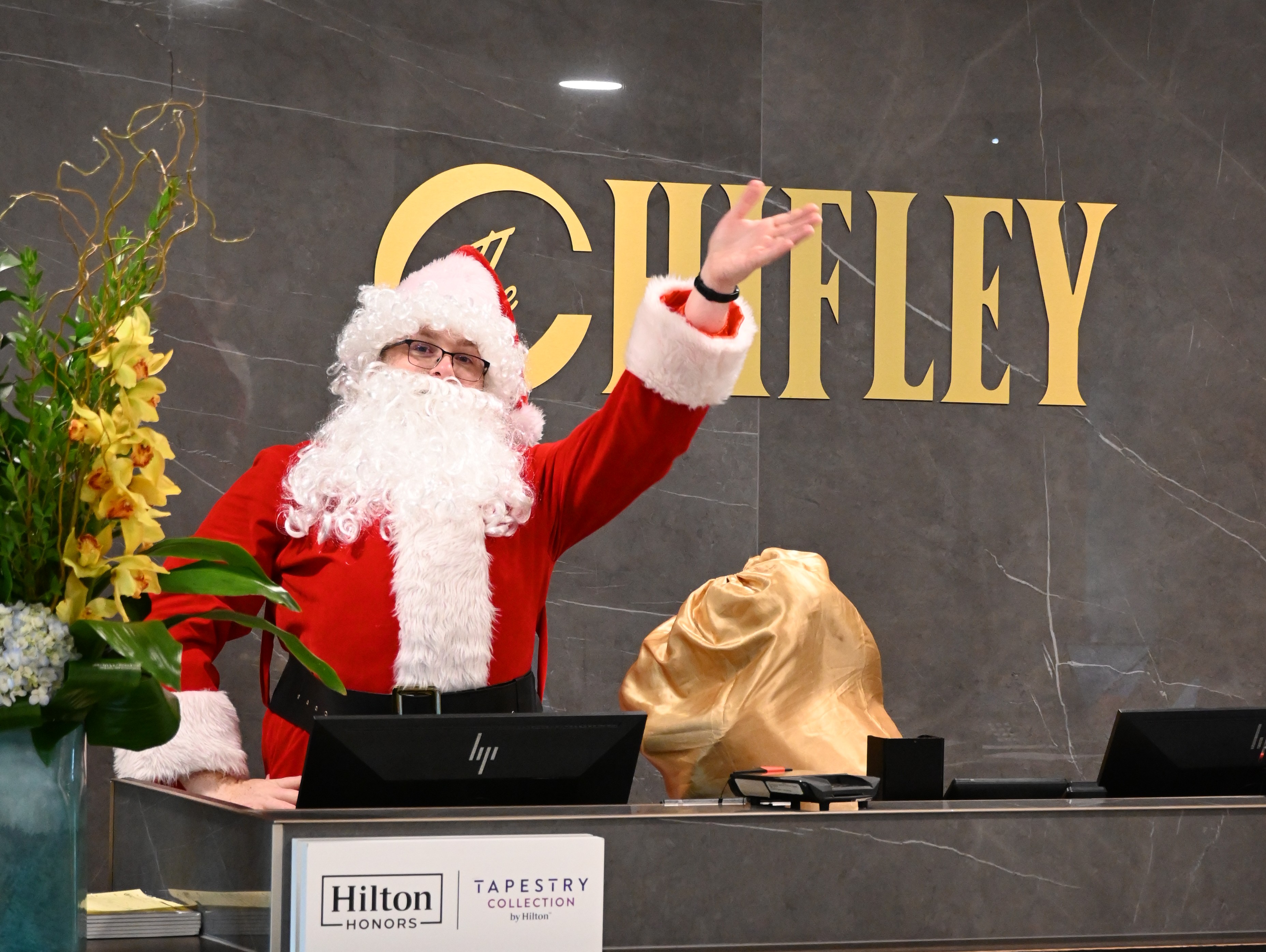 Santa Claus at the front desk of The Chifley Houston
