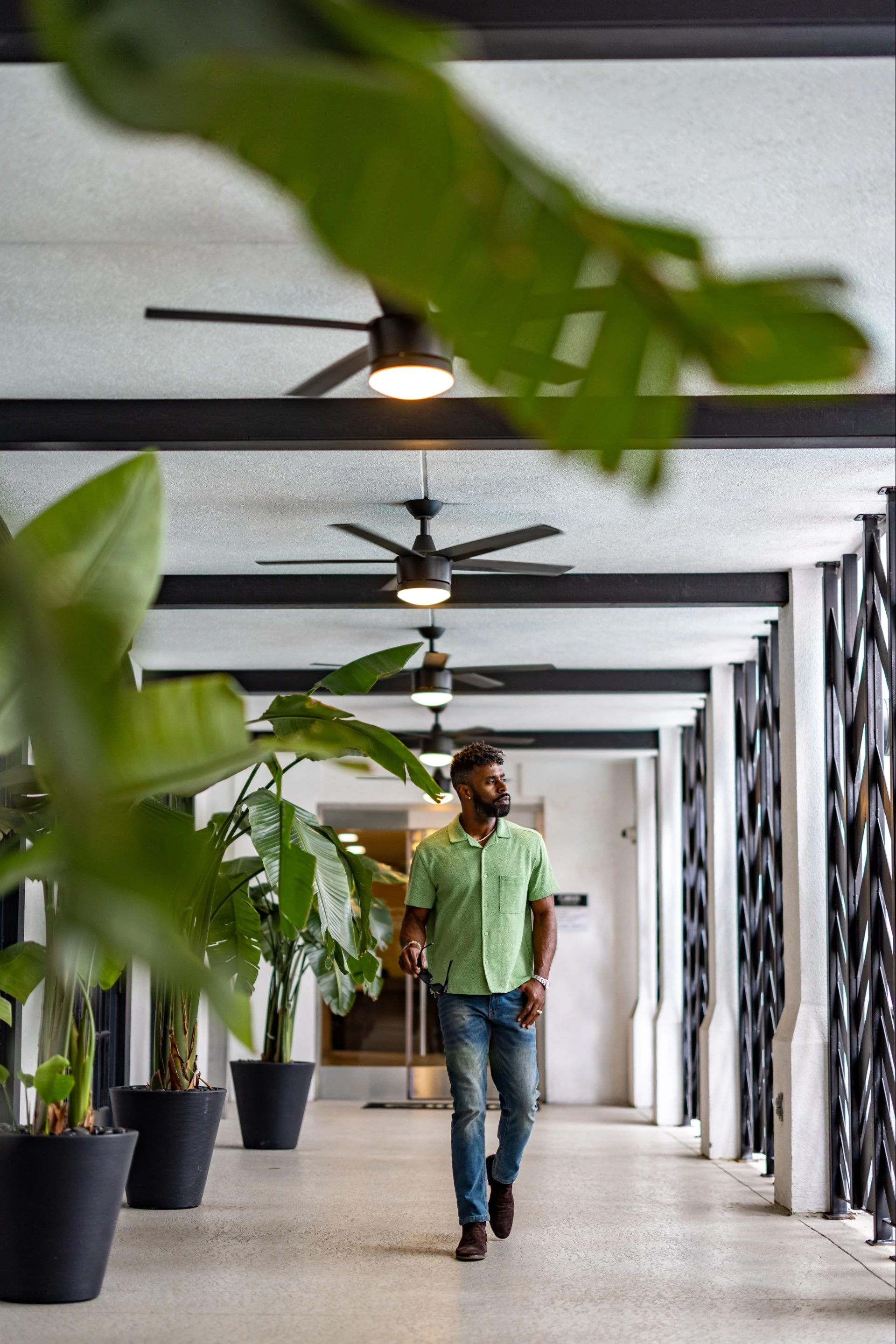 a man walking in a hallway