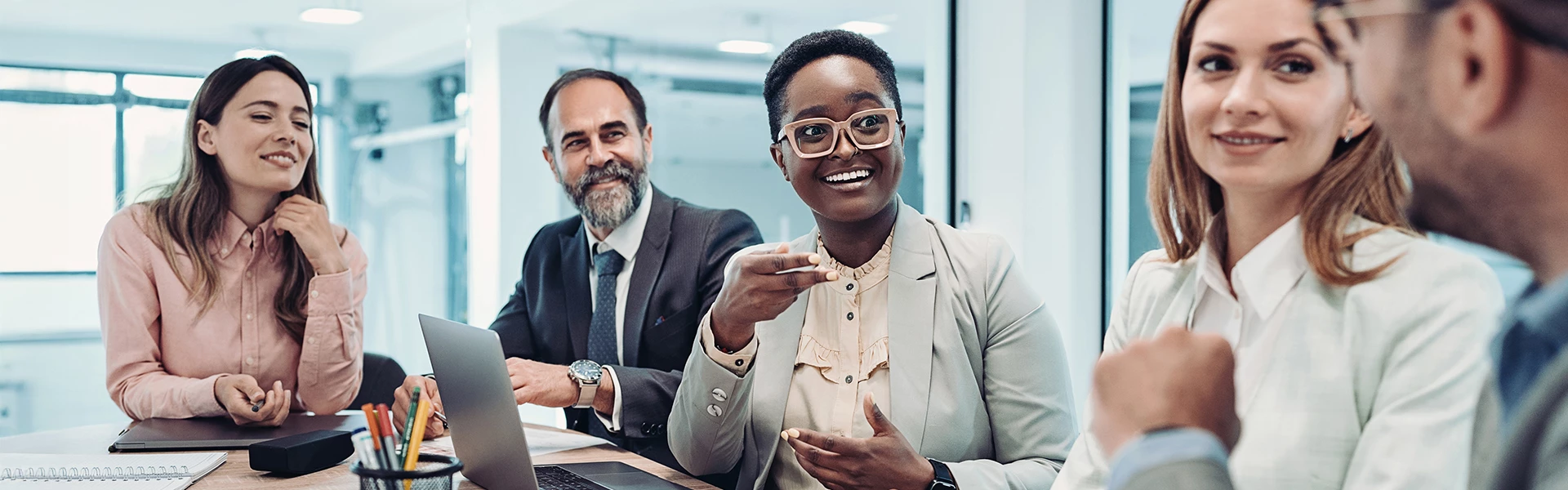 a man and woman smiling at the camera