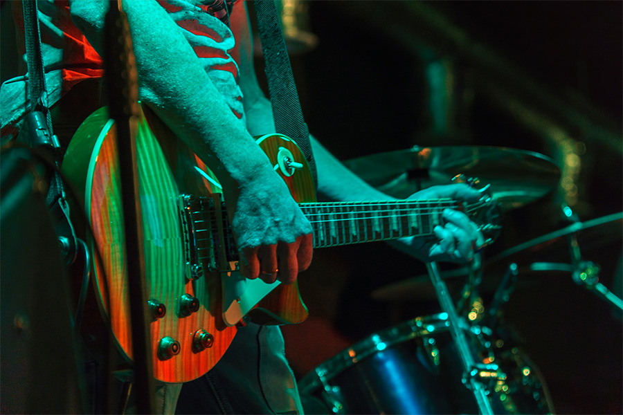 a person playing a guitar