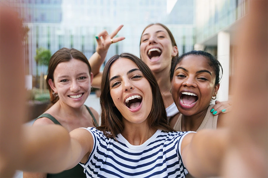 a group of women smiling for a selfie