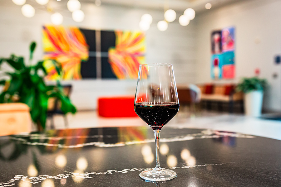 a glass of wine on a table