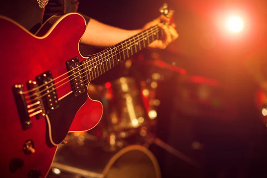 a person playing a guitar
