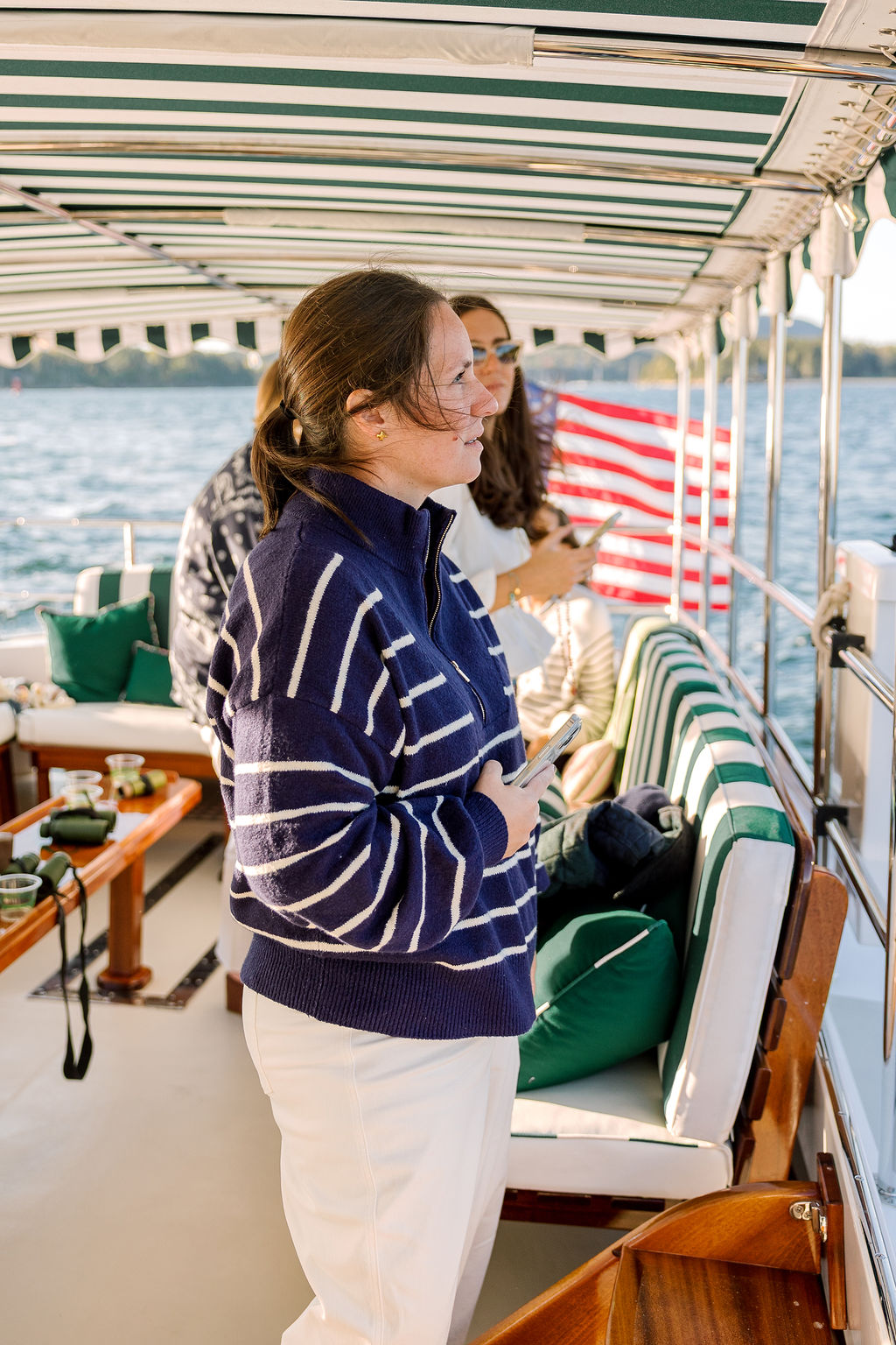a woman standing on a boat