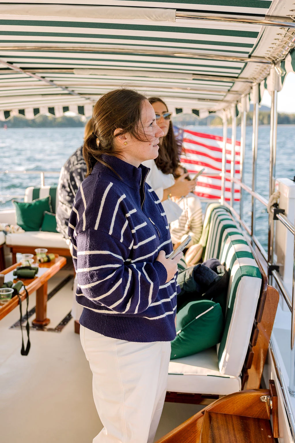 a woman standing on a boat