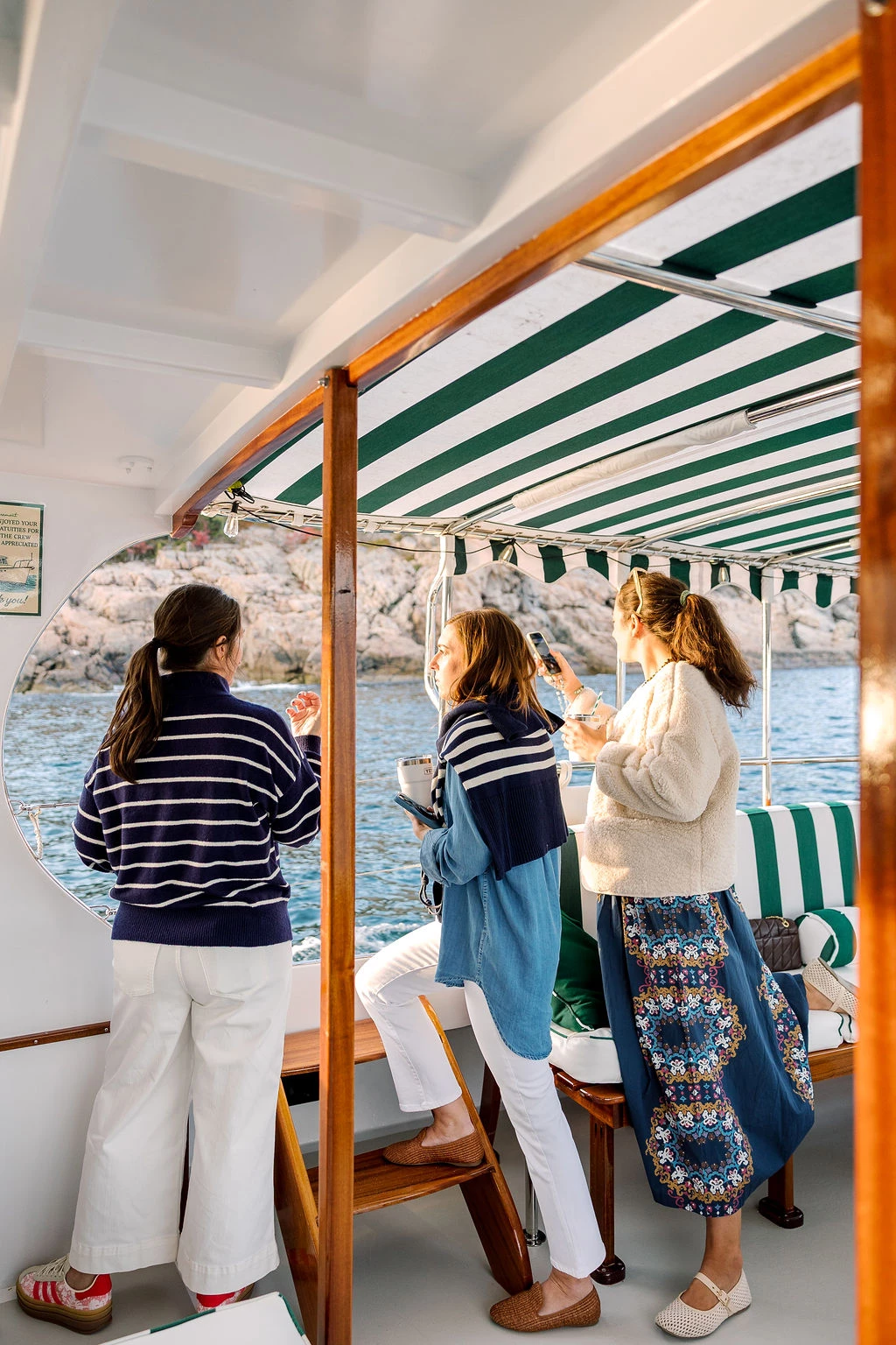 a group of women on a boat