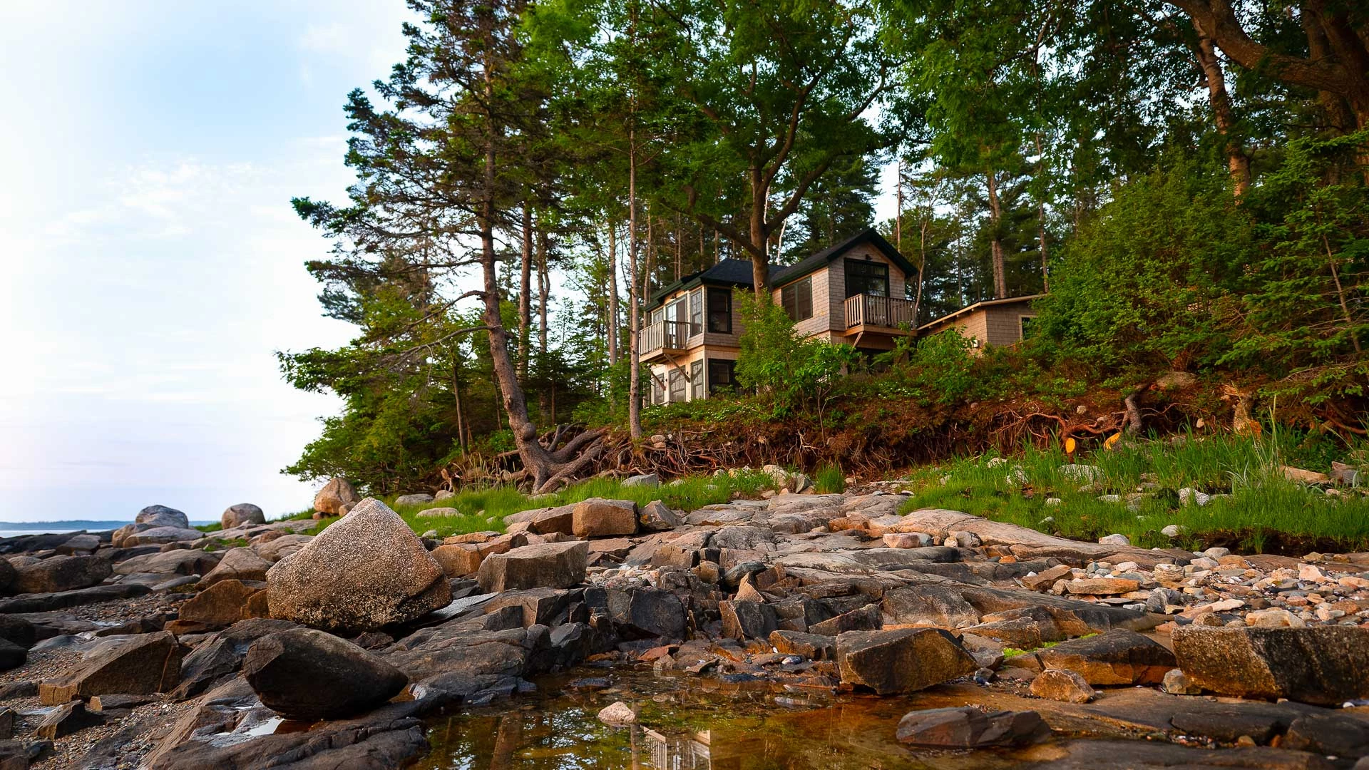 a house on a rocky shore