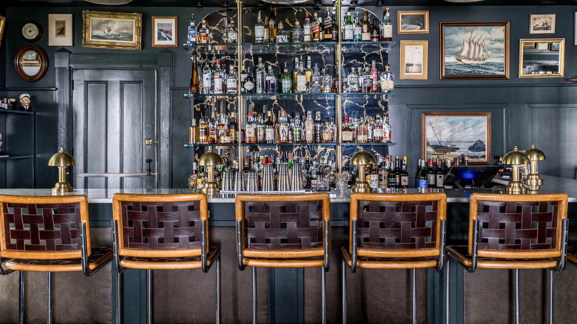 a bar with bottles of alcohol