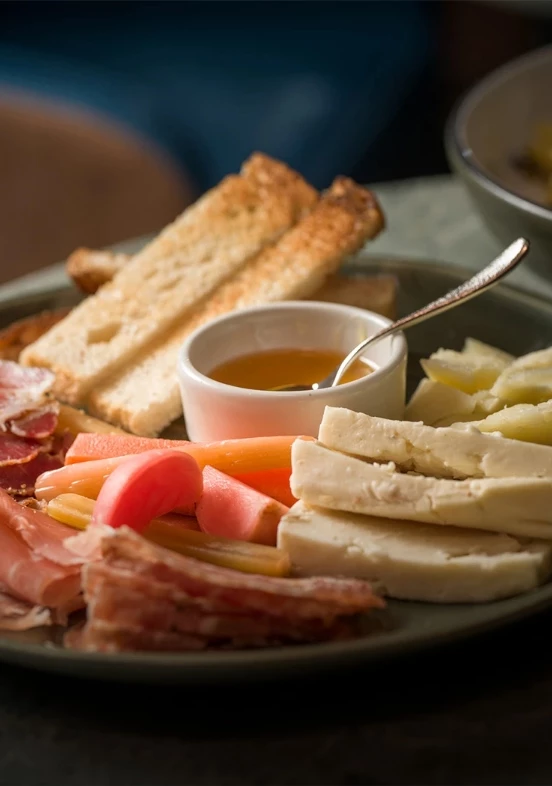 a plate of food with a spoon