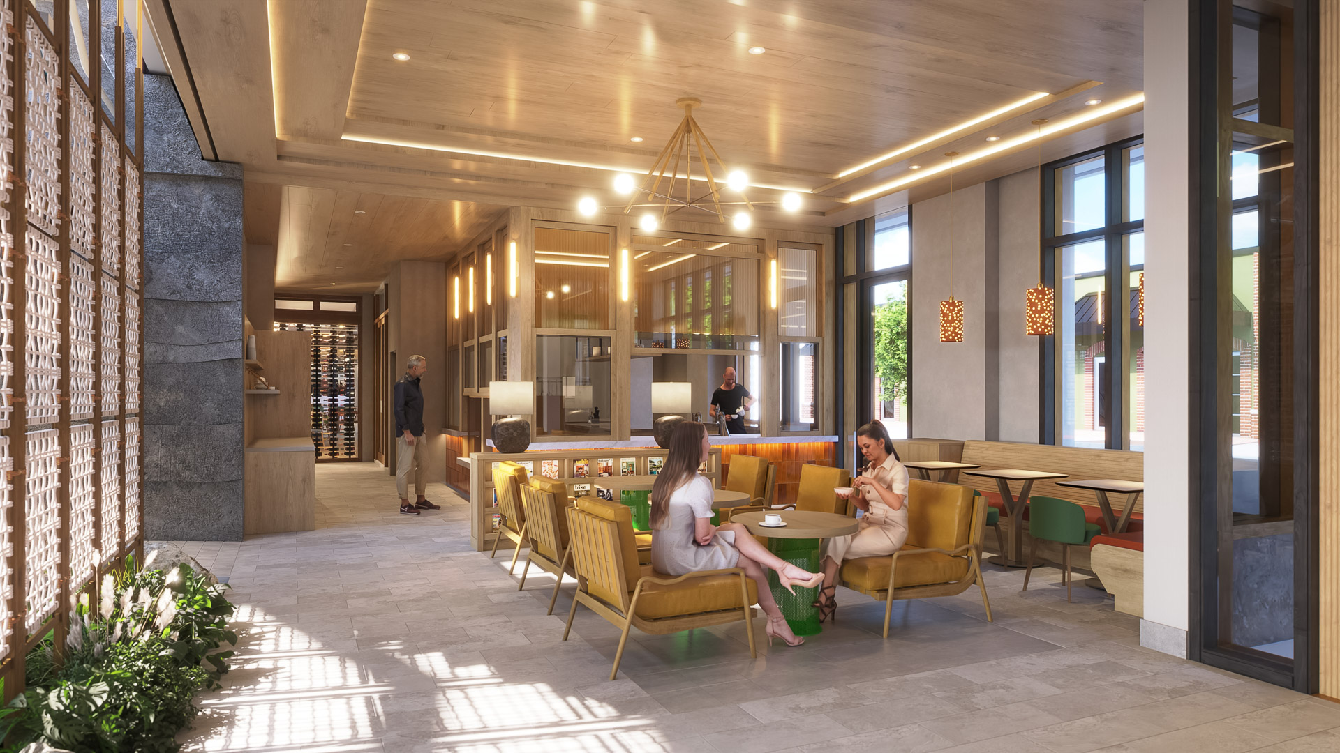 a group of people sitting at a table in a room with a wine cellar