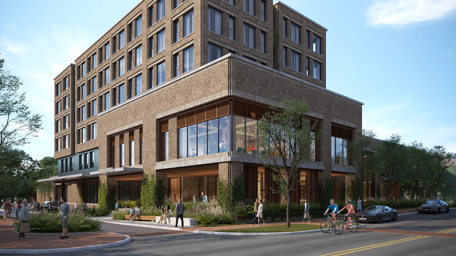 a building with people walking by a street