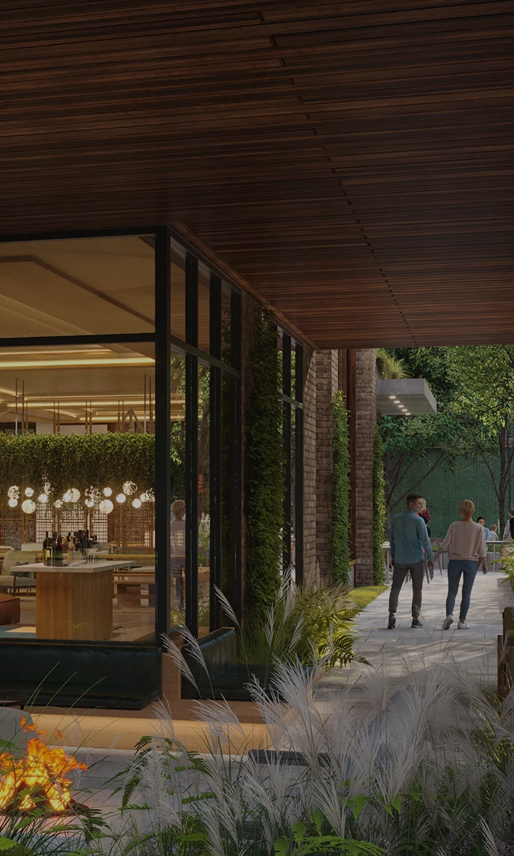 a group of people walking down a walkway