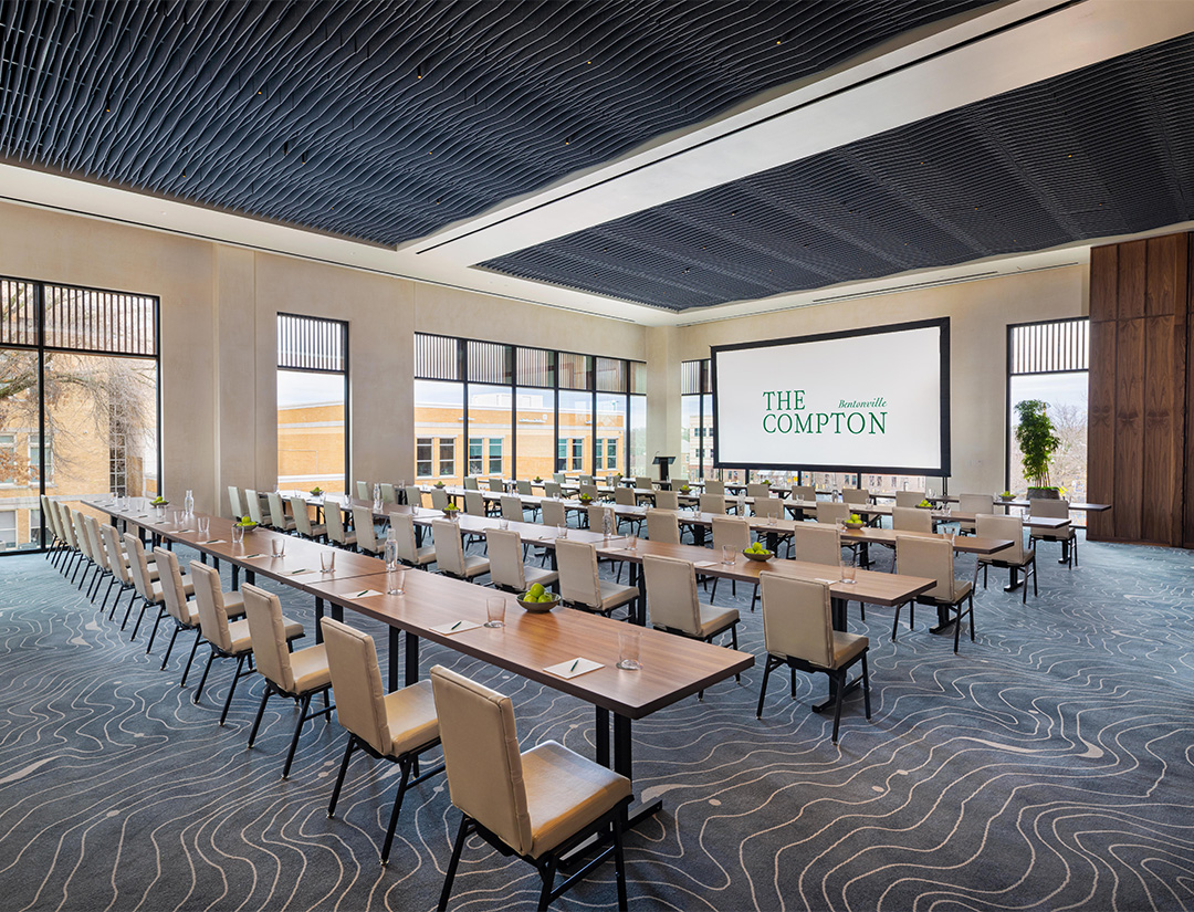 a large room with tables and chairs