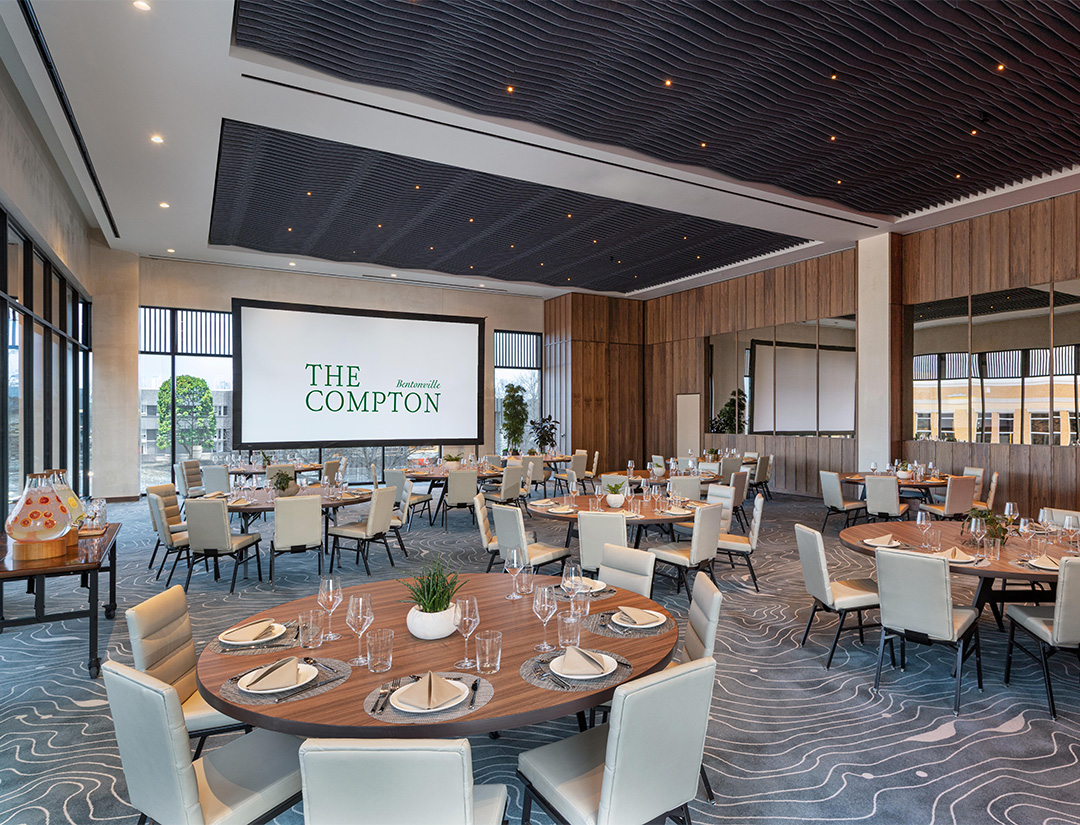 a room with tables and chairs