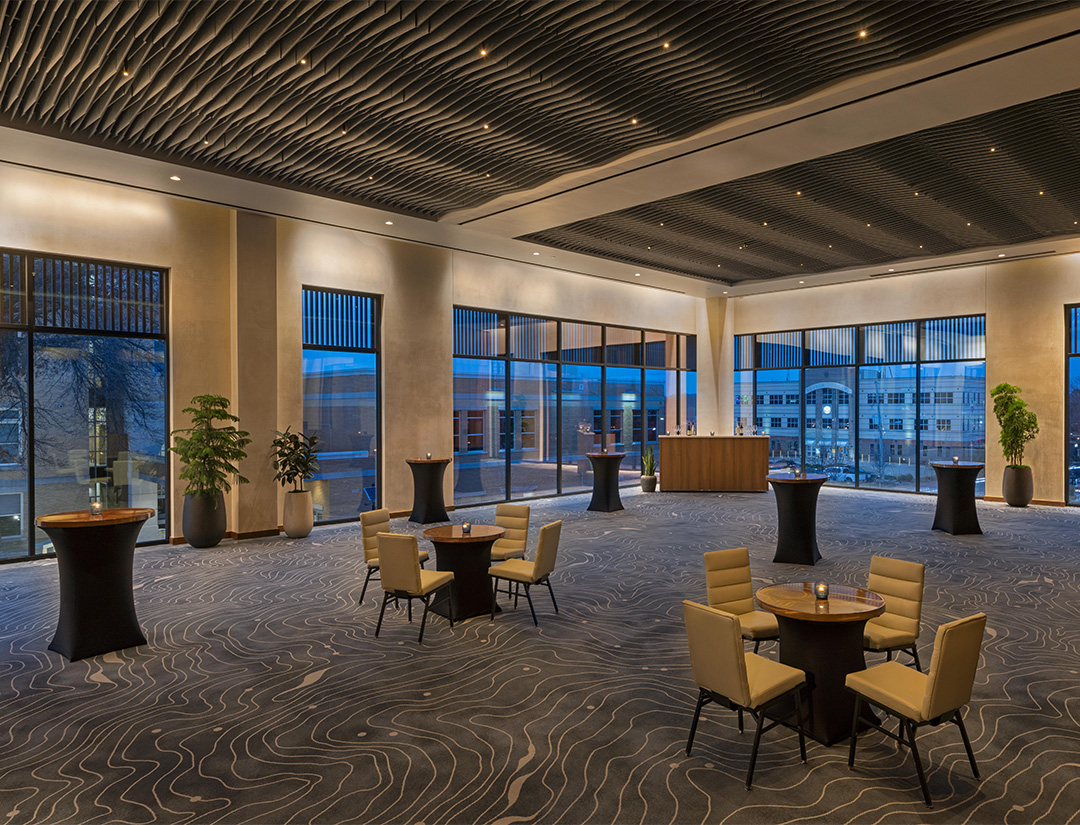 a room with tables and chairs