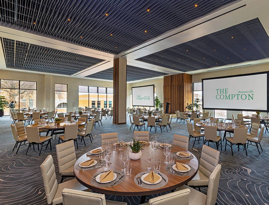 a large room with tables and chairs