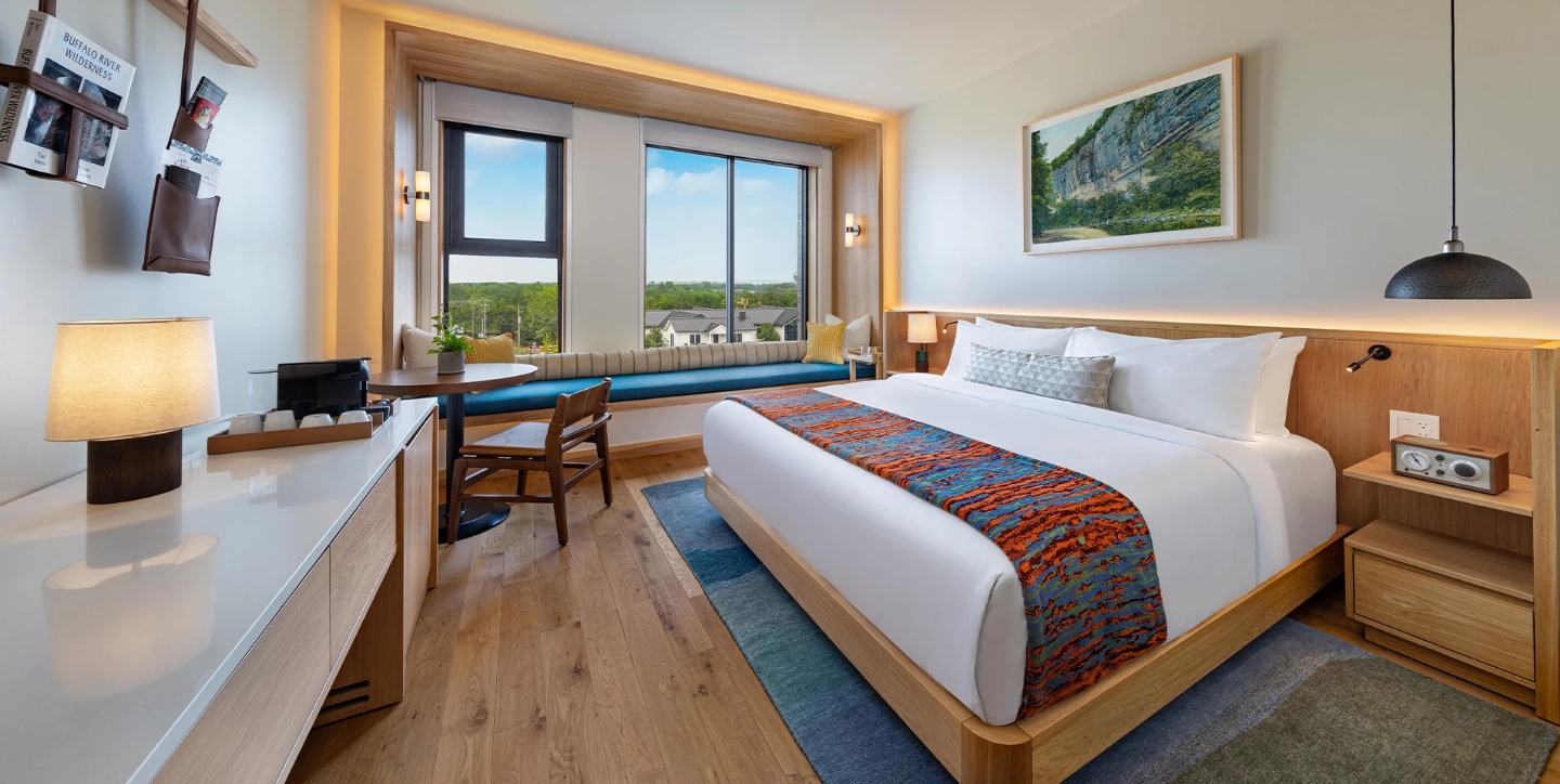 a room with a bed and a window