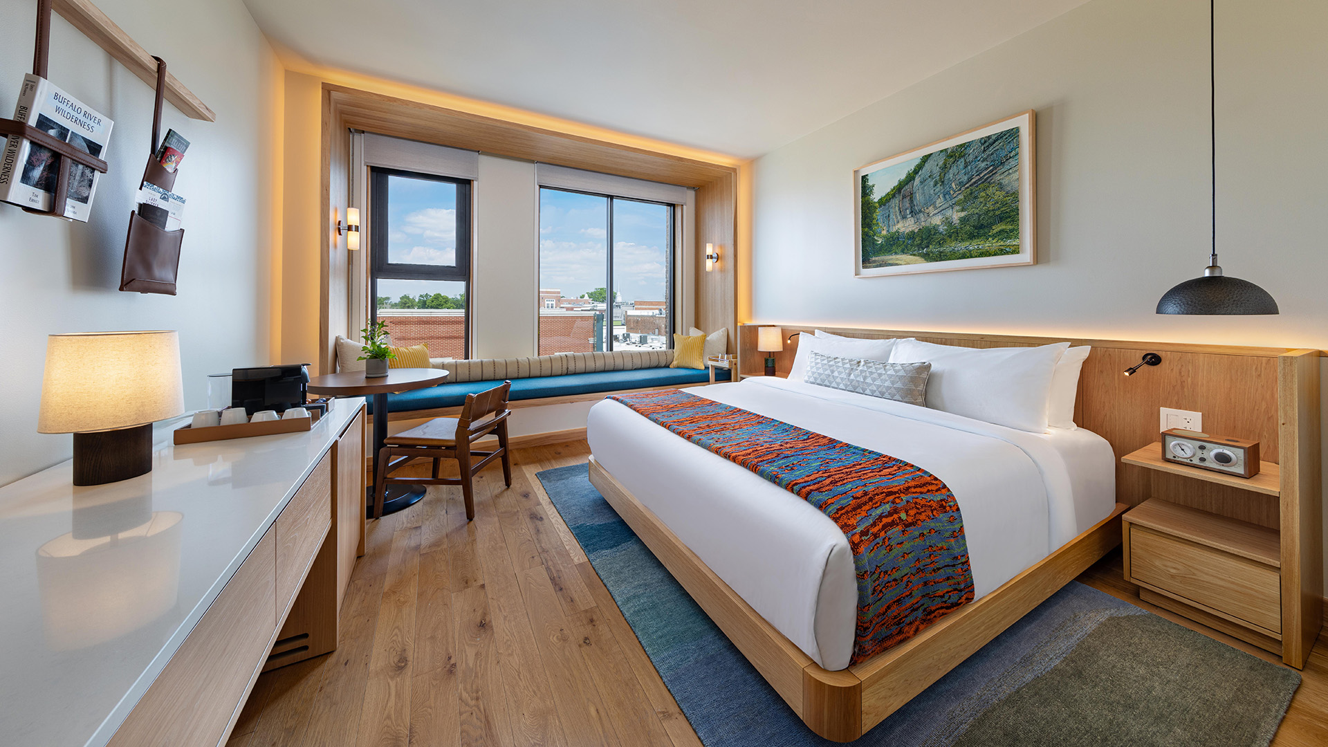 a room with a bed and a table