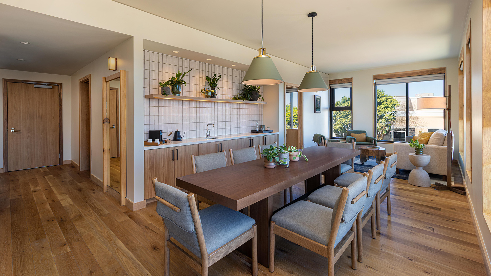 a dining table and chairs in a room