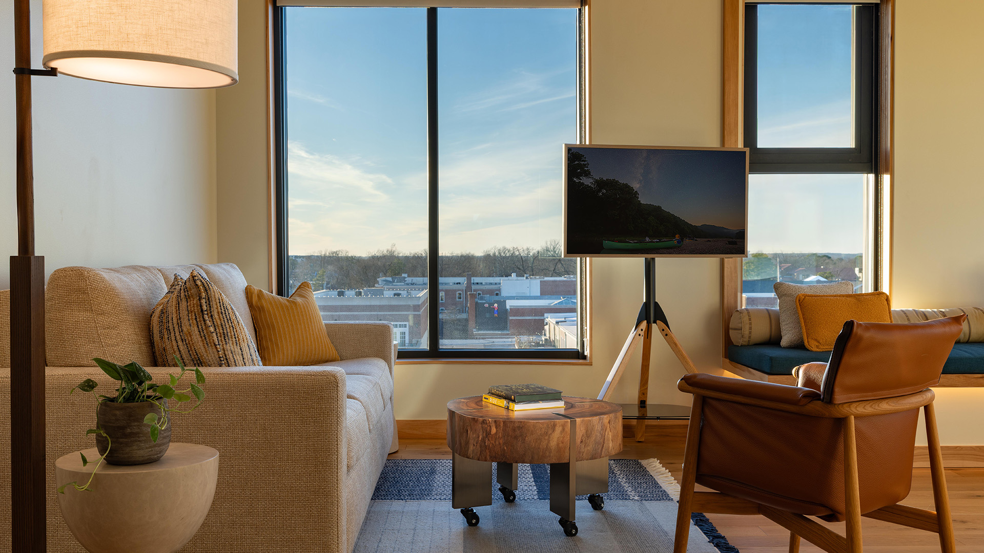 a living room with a couch and a tv