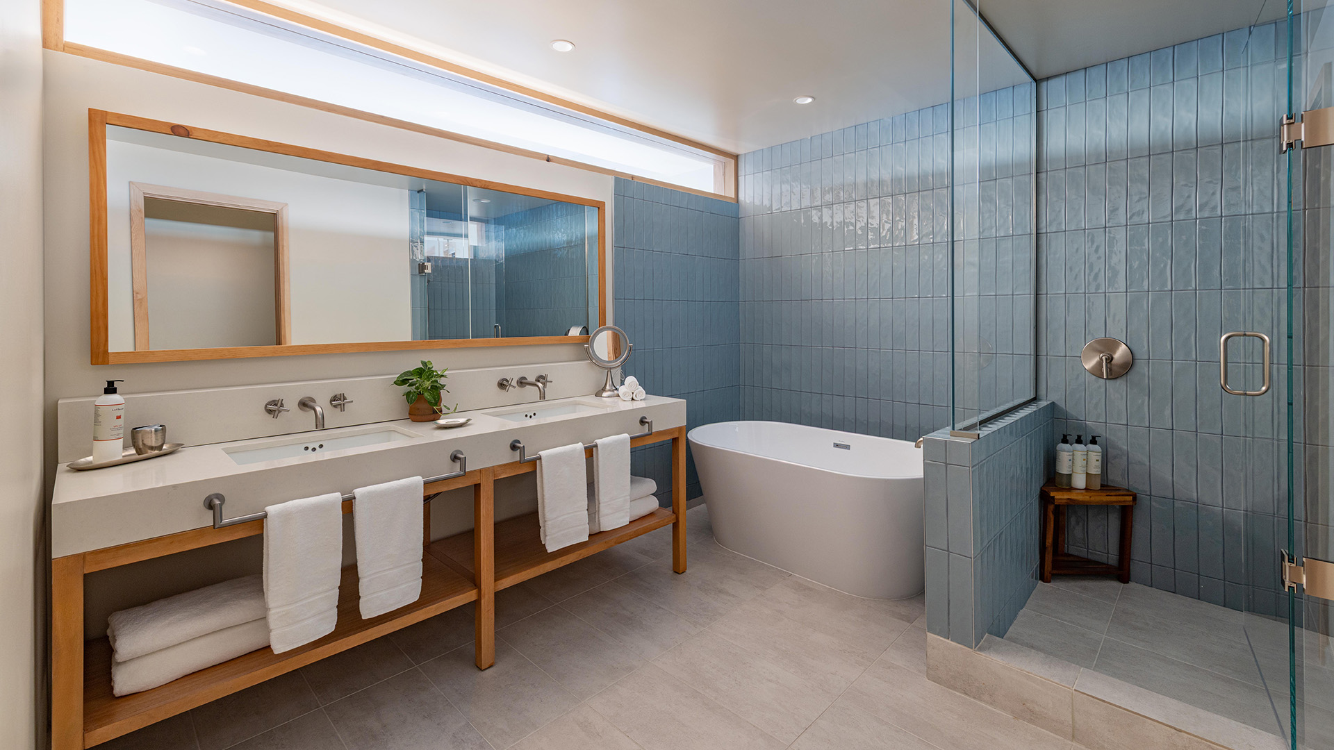 a bathroom with a tub and sink