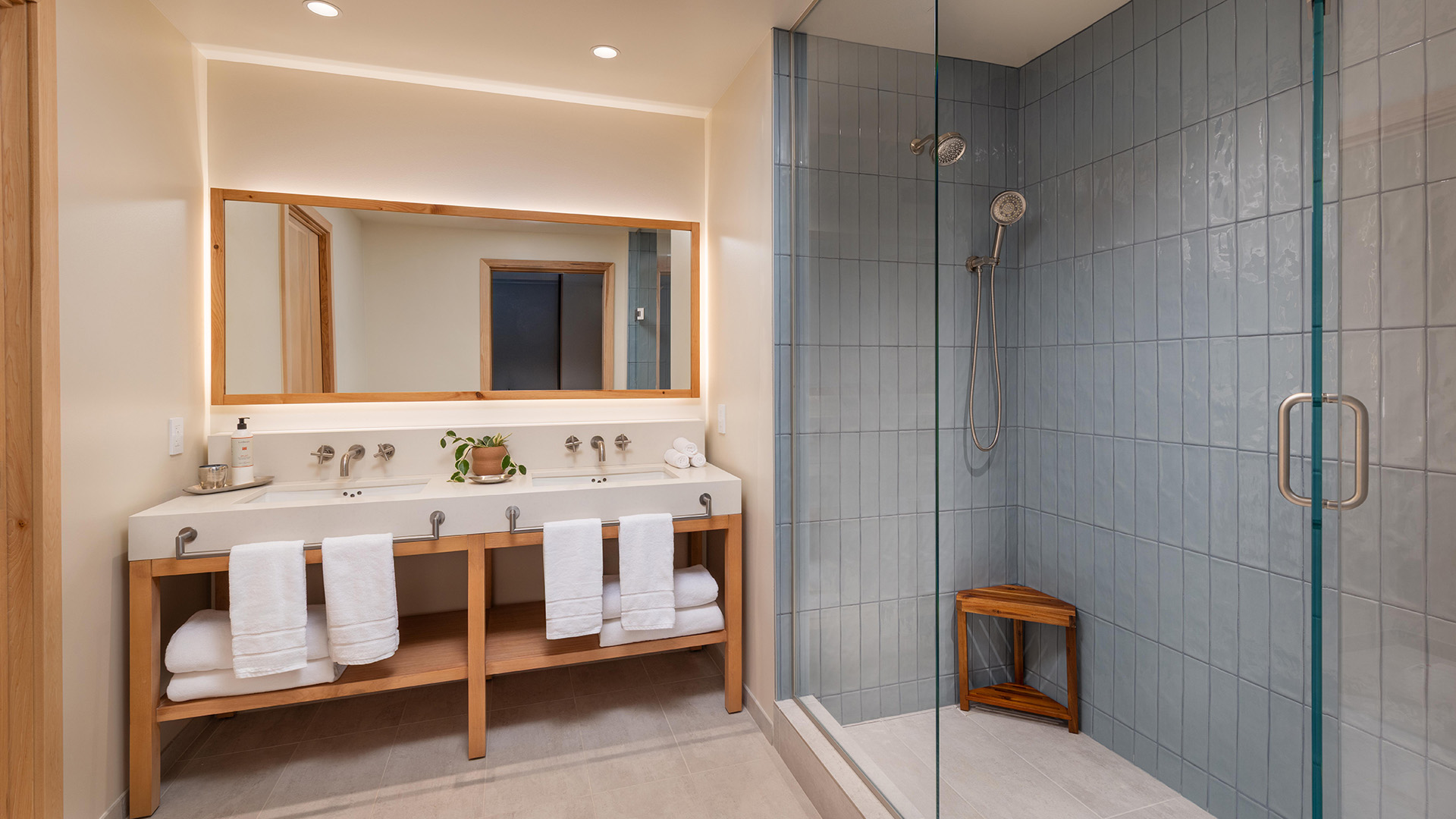 a bathroom with a shower and a sink