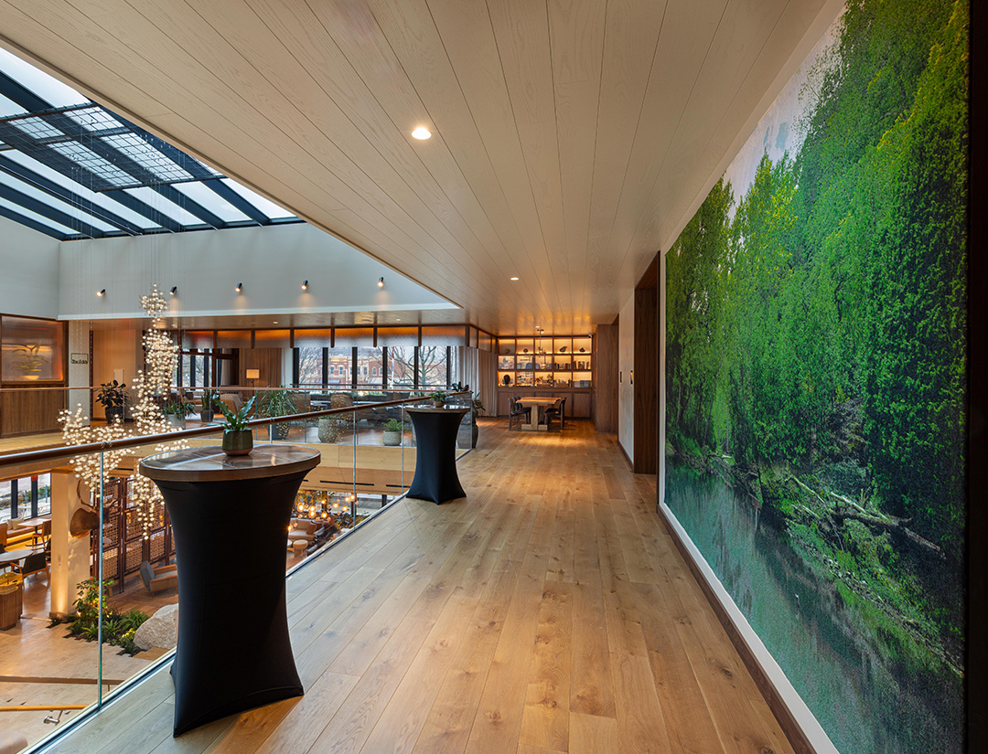 a room with a large painting on the wall