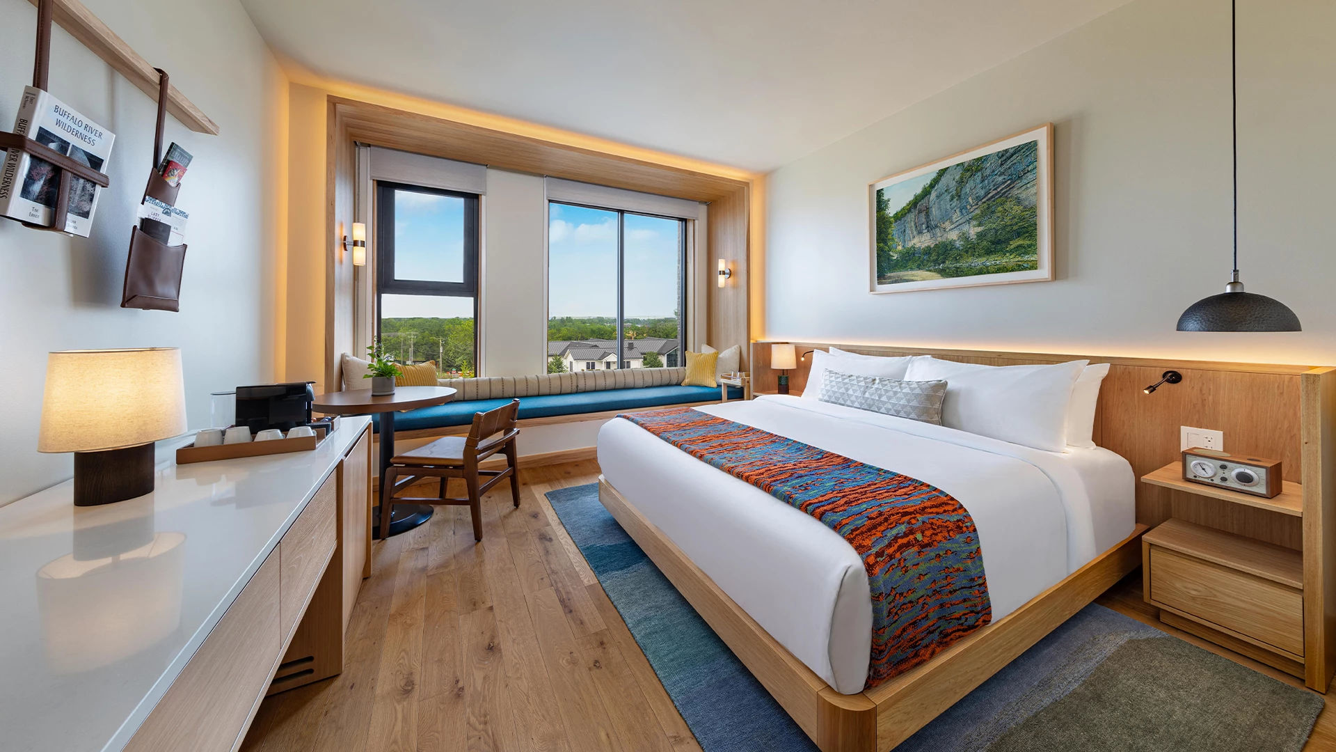 a room with a bed and a desk