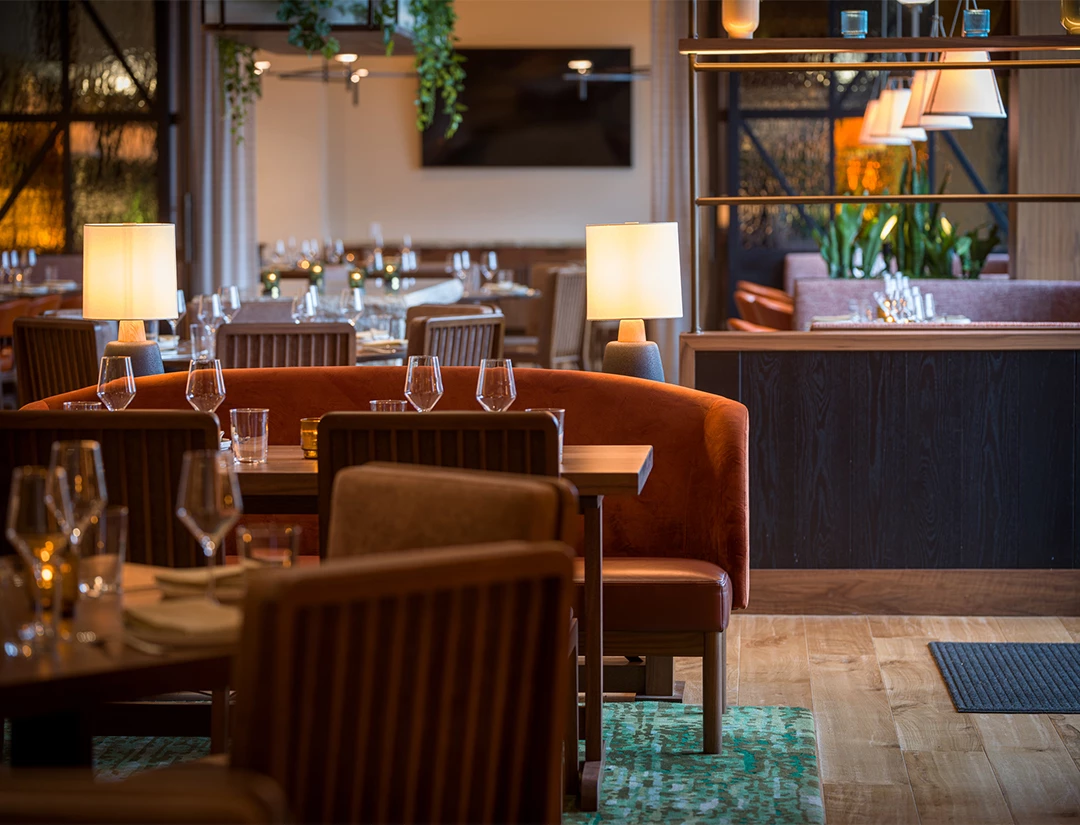 a restaurant with tables and chairs