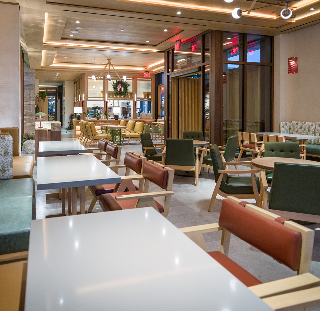 a room with tables and chairs