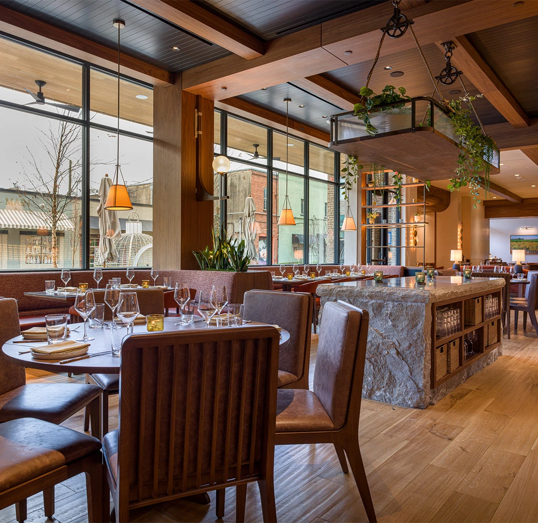 a restaurant with tables and chairs