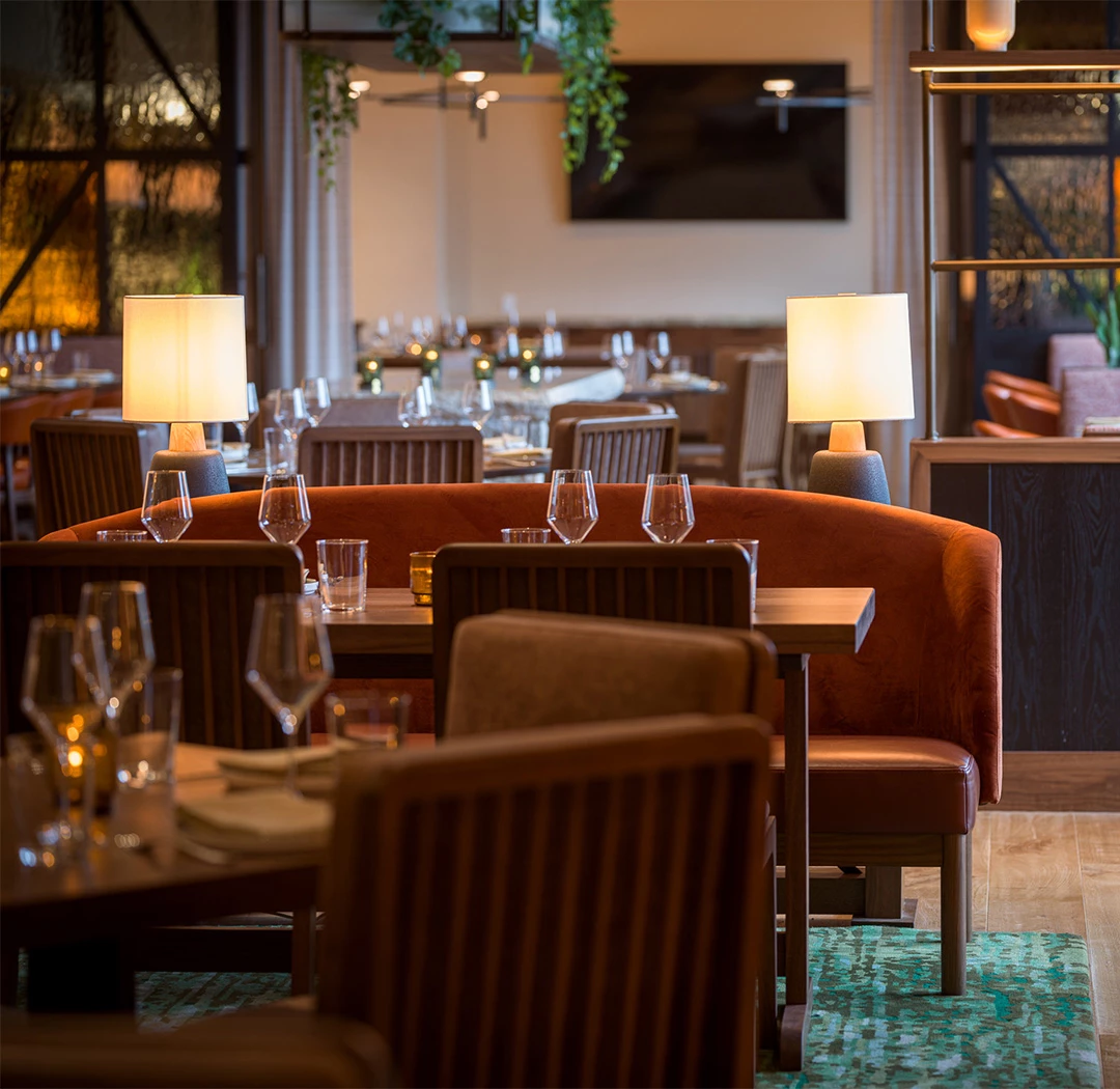 a restaurant with tables and chairs