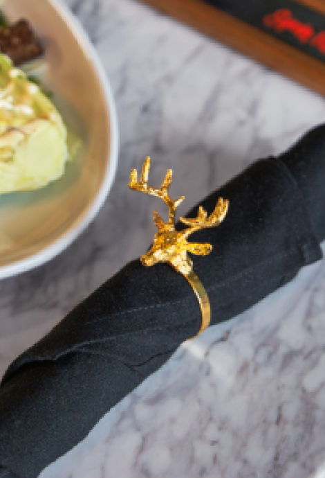 a napkin with a ring on it