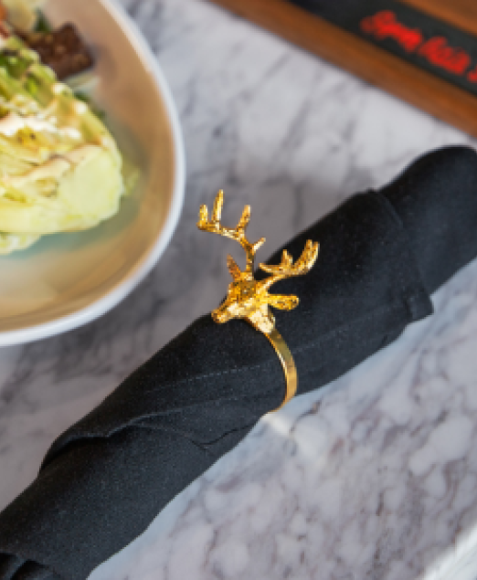 a napkin with a ring on it