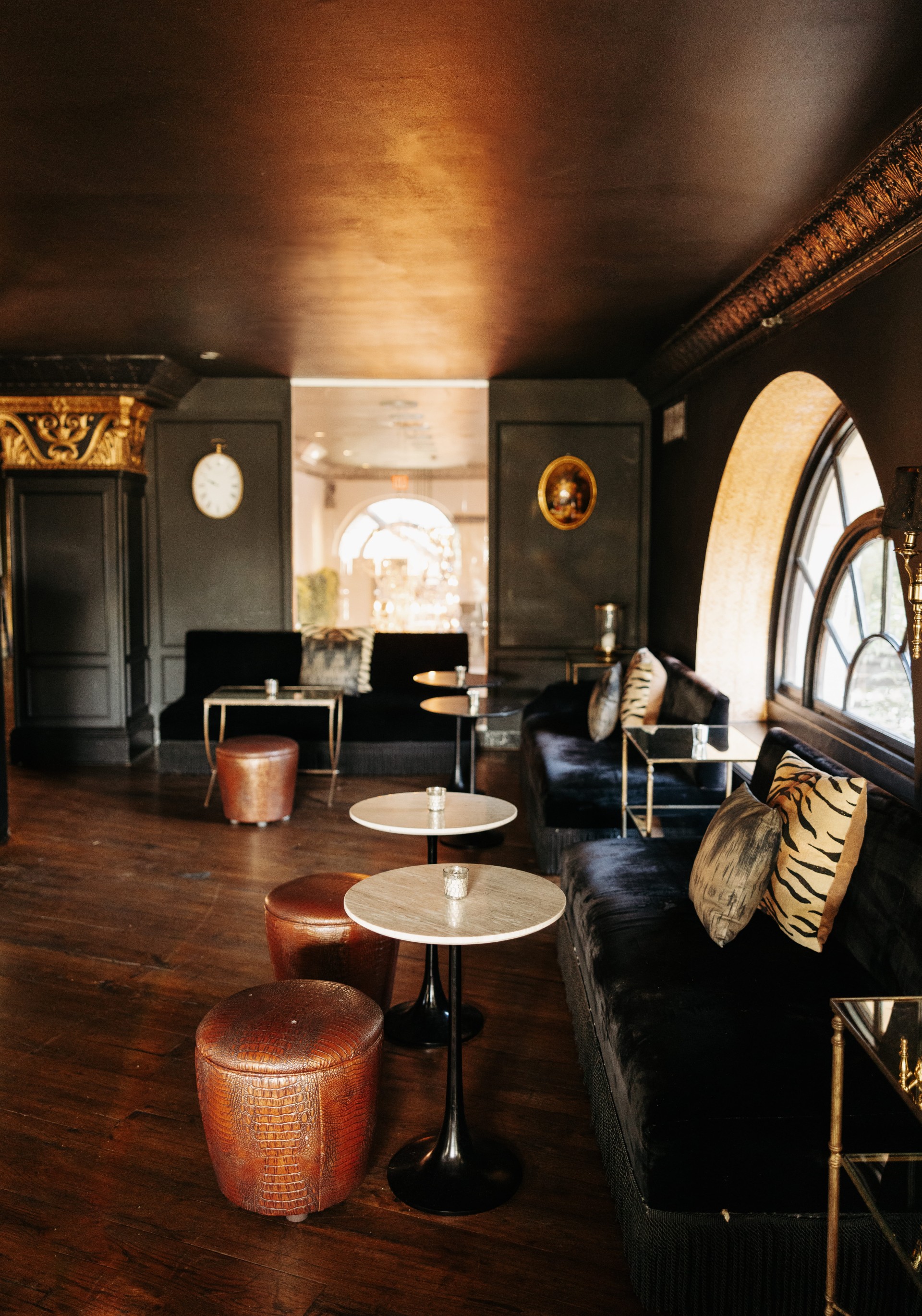 a room with a couch and tables