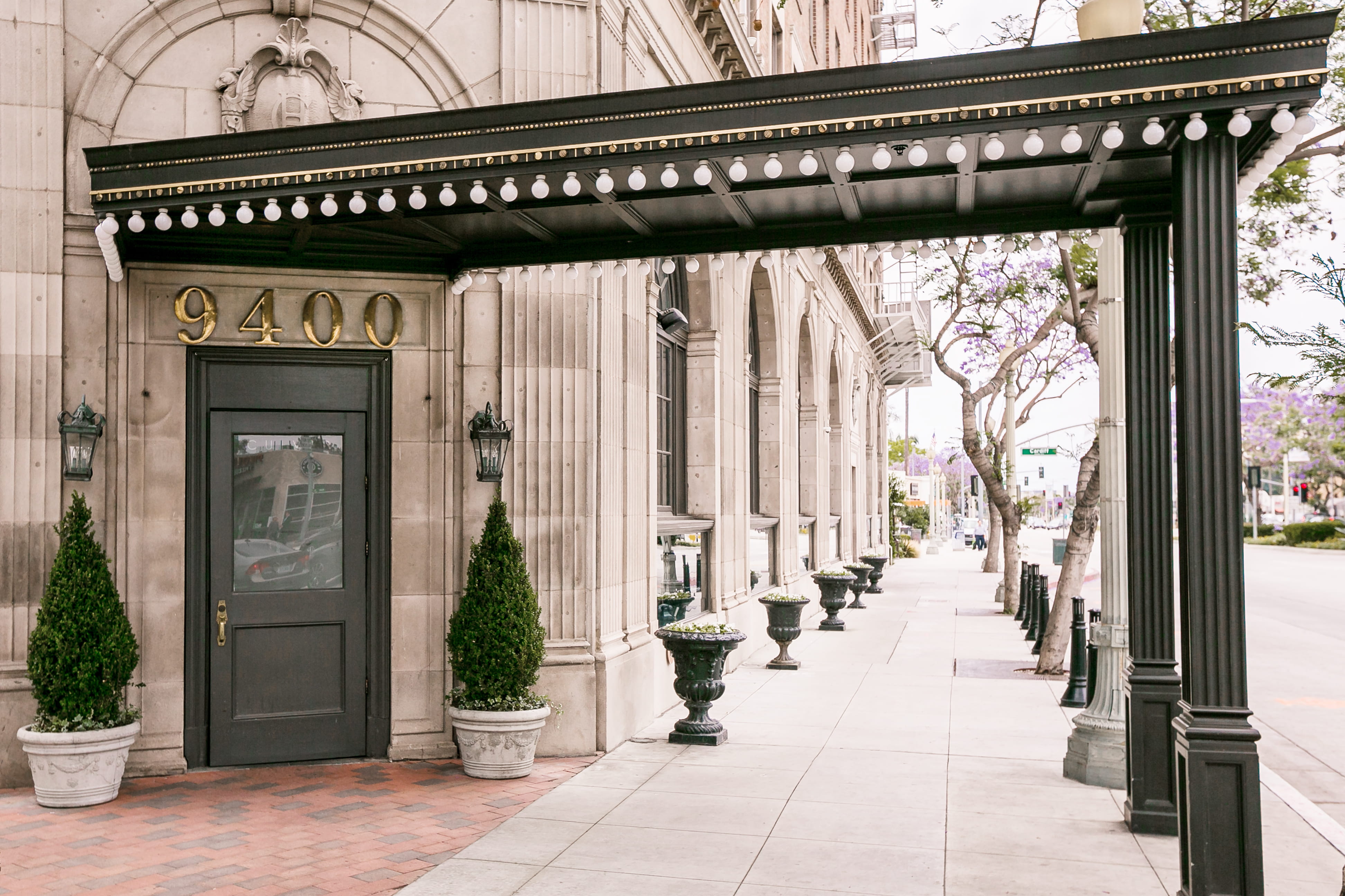 a building with a awning over a sidewalk