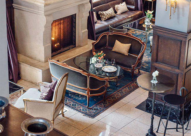 a living room with a fireplace and a couch
