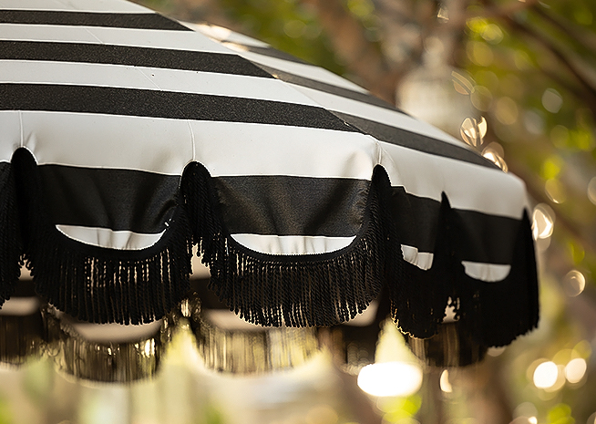 a black and white striped umbrella