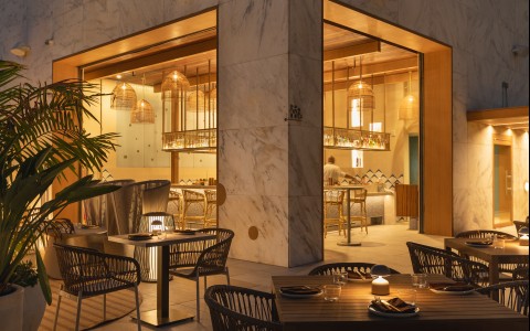 a restaurant with tables and chairs