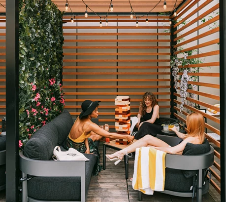 a group of women sitting on a couch