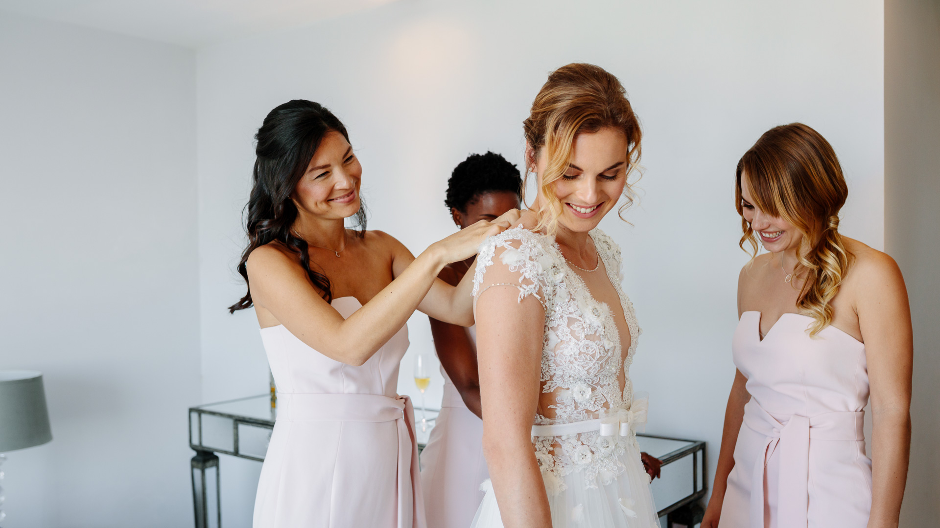 a group of women in dresses