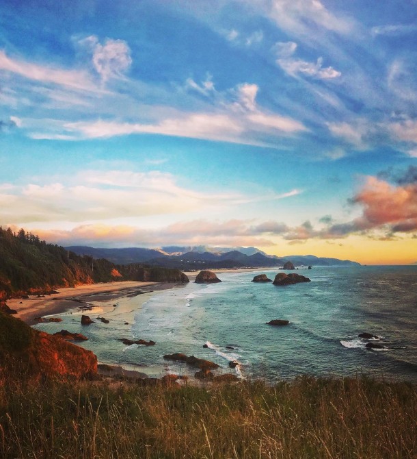a beach with rocks and water