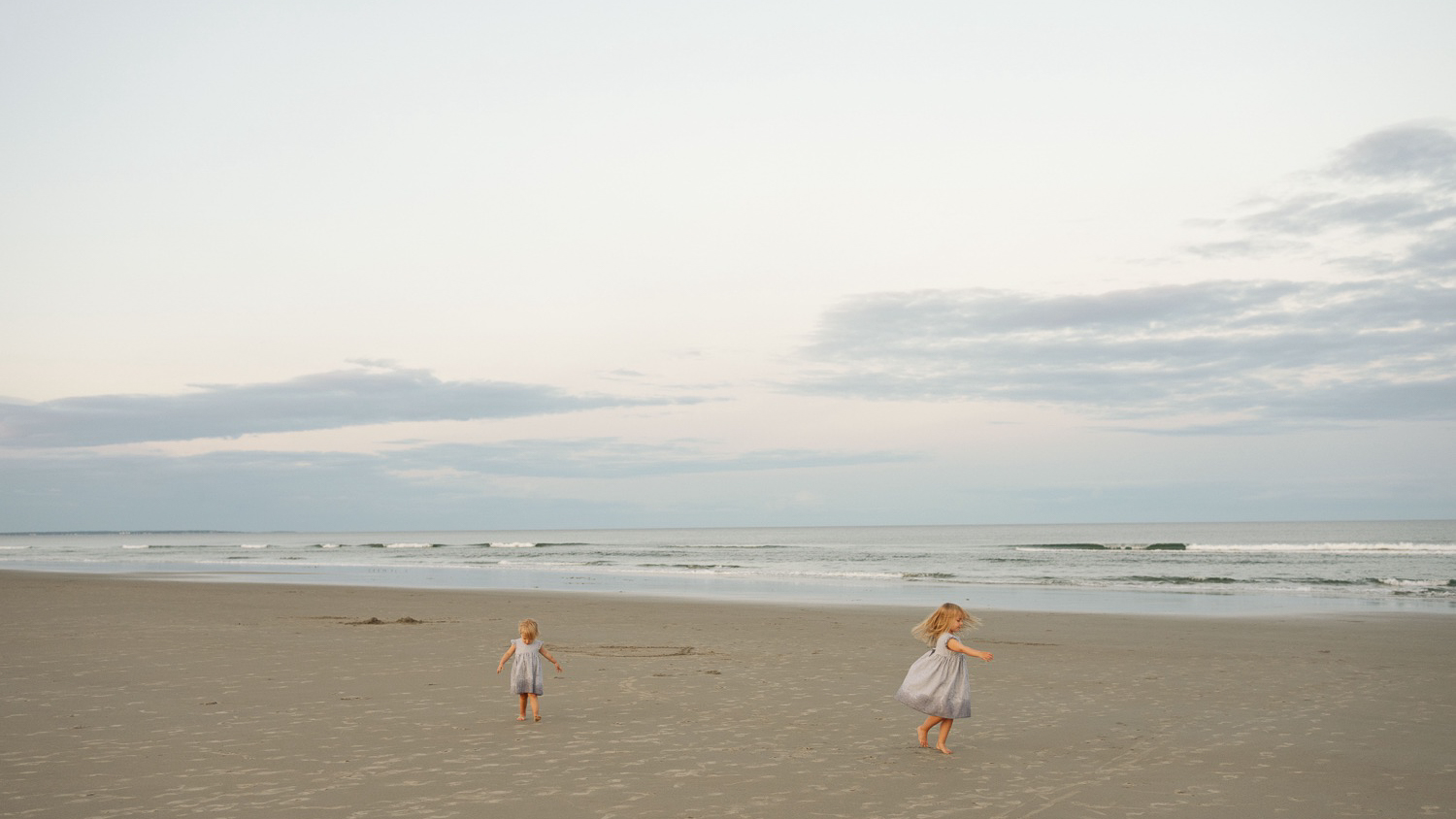 two children playing on a beach